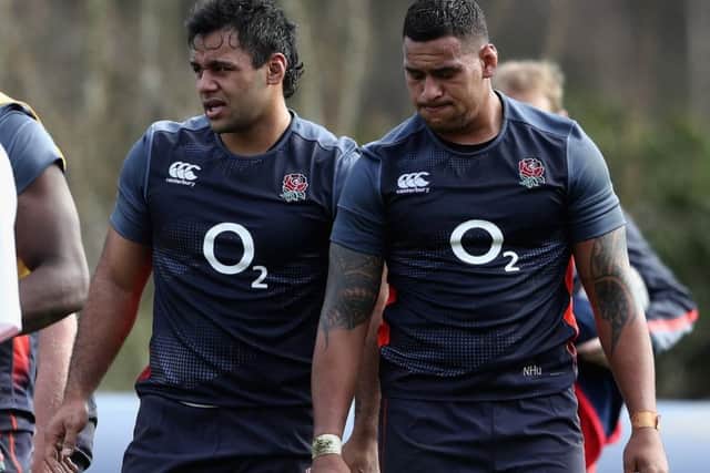 Billy Vunipola, left, is expected to replace Nathan Hughes, right, as England's No 8 against Scotland. Picture: David Rogers/Getty Images