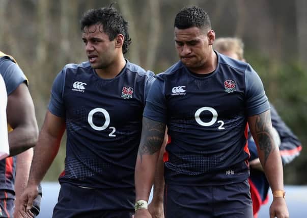 Billy Vunipola, left, is expected to replace Nathan Hughes, right, as England's No 8 against Scotland. Picture: David Rogers/Getty Images