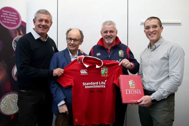 Gavin Hastings, Warren Gatland, Cure Parkinsons Trust President Tom Isaacs and Dr Tilo Kunath at the MRC Centre for Regenerative Medicine at the University of Edinburgh.