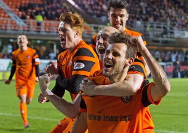 Dundee United striker Tony Andreu celebrates the goal which beat Hibs at Tannadice in December. Picture: Craig Foy/SNS