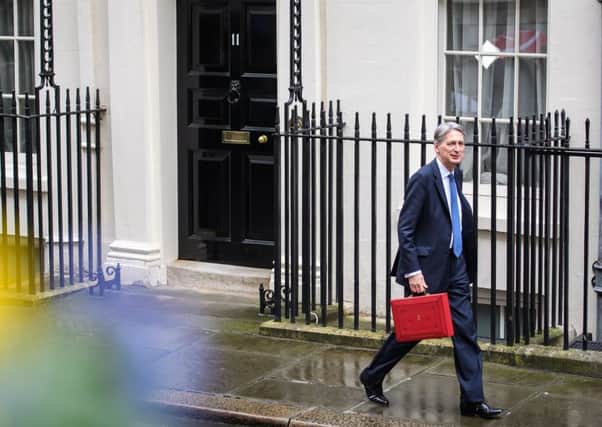 Chancellor Philip Hammond leaves 11 Downing Street ahead of his budget speech in the House of Commons. Picture: Leon Neal/Getty Images