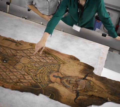 The shroud is examined. Picture: National Museum of Scotland