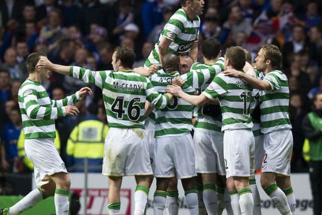 Rangers had won the title, but Celtic celebrate victory in the Old Firm match as if they were the champions. Picture: SNS.