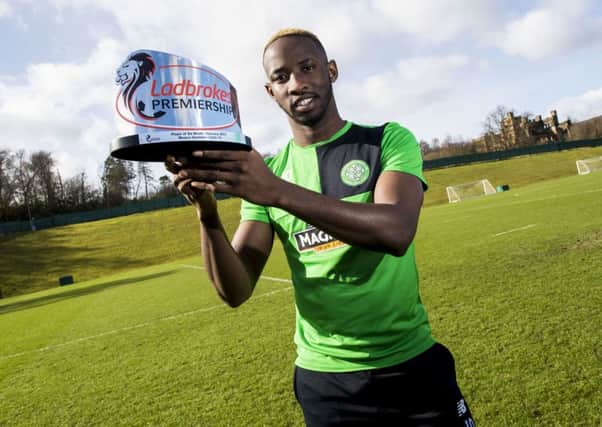 Moussa Dembele receives the Ladbrokes Player of the Month award for February