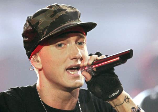 Eminem will headline this year's Summer Sessions. Picture: AP
