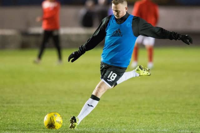 Derek Riordan warms up for new club Edinburgh City. Picture: Ian Georgeson.