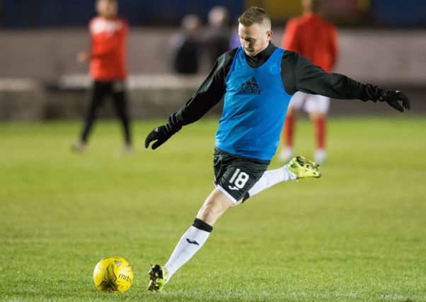 Derek Riordan warms up for new club Edinburgh City. Picture: Ian Georgeson.
