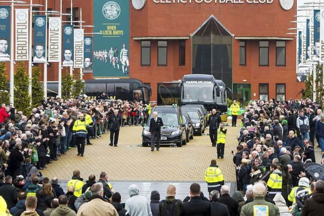 Fans pay tribute as Tommy Gemmell's coffin leaves Celtic Park. Picture: SNS