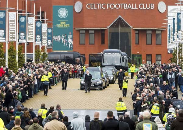 Fans pay tribute as Tommy Gemmell's coffin leaves Celtic Park. Picture: SNS