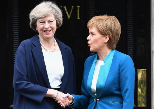 Despite her announcement on a second independence referendum, Nicola Sturgeon will continue to have a strong interest in Theresa Mays Brexit negotiations. Picture: Getty Images