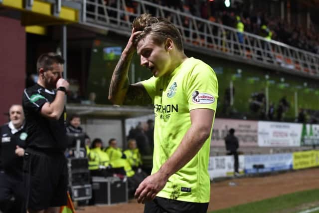 Hibernian's Jason Cummings is sent off following a second booking. Picture: SNS