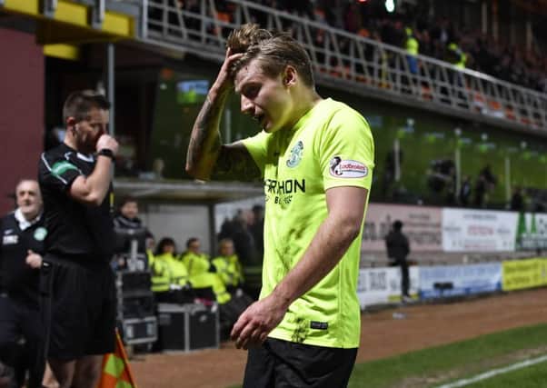 Hibernian's Jason Cummings is sent off following a second booking. Picture: SNS