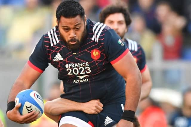 Prop Uini Atonio tries to escape Italian defenders during Frances 40-18 victory, their first Six Nations away win for two years. Picture: Alberto Pizzoli/AFP/Getty