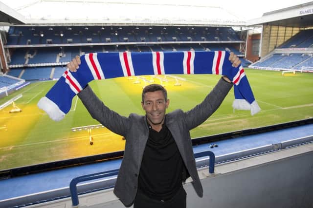 Pedro Caixinha poses at Ibrox after being confirmed as the new Rangers manager on a three-year deal. Picture: Kirk O'Rourke/Rangers FC/Press Association Images
