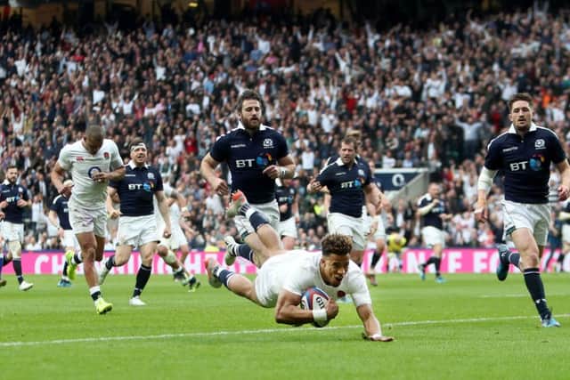 Anthony Watson scores his side's third try of the Scotland drubbing. Picture: David Davies/PA Wire.