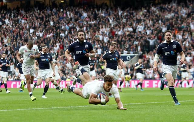 Anthony Watson scores his side's third try of the Scotland drubbing. Picture: David Davies/PA Wire.