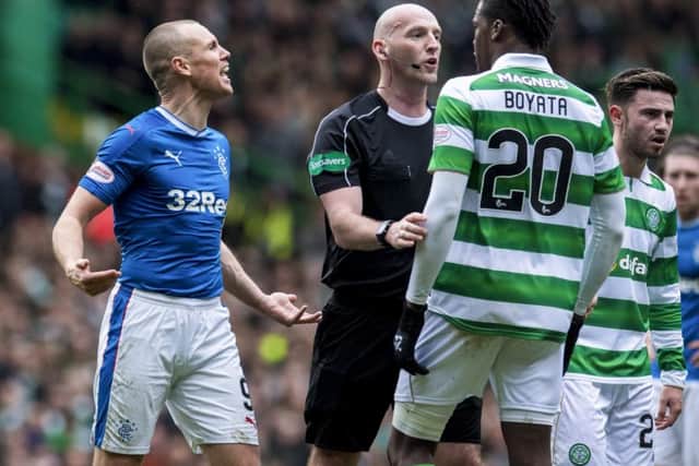 Kenny Miller and Dedryck Boyata clash. Picture: SNS/