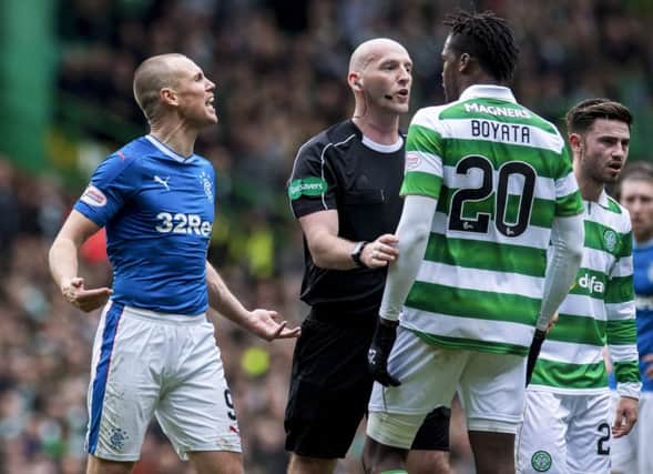Kenny Miller and Dedryck Boyata clash. Picture: SNS/