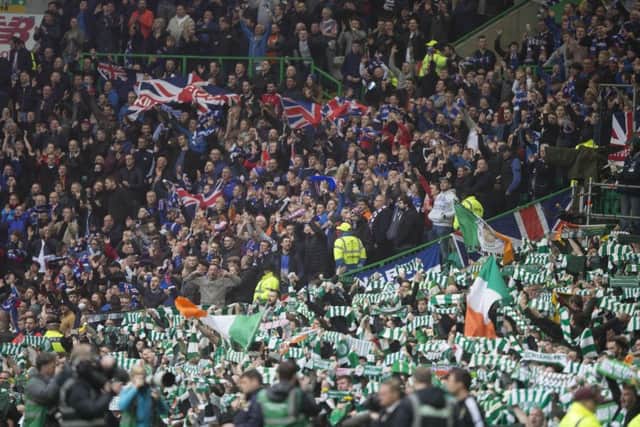 Celtic and Rangers fans inside Celtic Park, Glasgow. Picture: Jeff Holmes/PA Wire