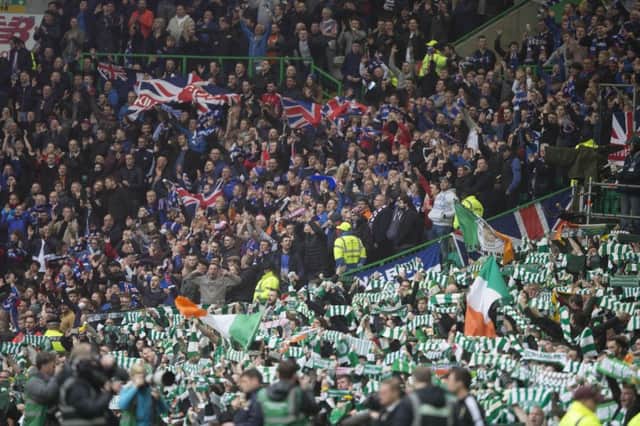 Celtic and Rangers fans inside Celtic Park, Glasgow. Picture: Jeff Holmes/PA Wire