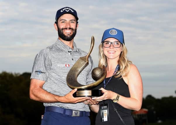 Adam Hadwin celebrates his Valspar Championship win with fiancee Jessica Dawn. Picture: Getty Images