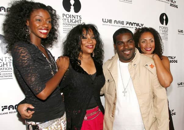 Joni Sledge, one of the original members of "Sister Sledge," second from left, posing with Rodney Jerkins, second from right, her niece Camille Sledge, left, and her cousin Amber Sledge. Picture:  AP Photo/Chris Polk