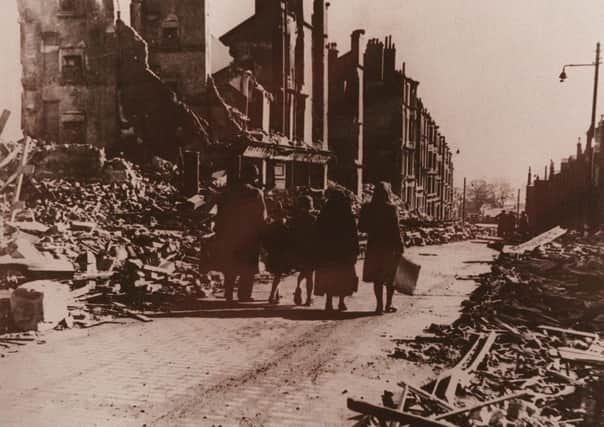 Evacuating Radnor Street, Clydebank, one morning after the Clydebank Blitz. Picture: Clydebank Central Library