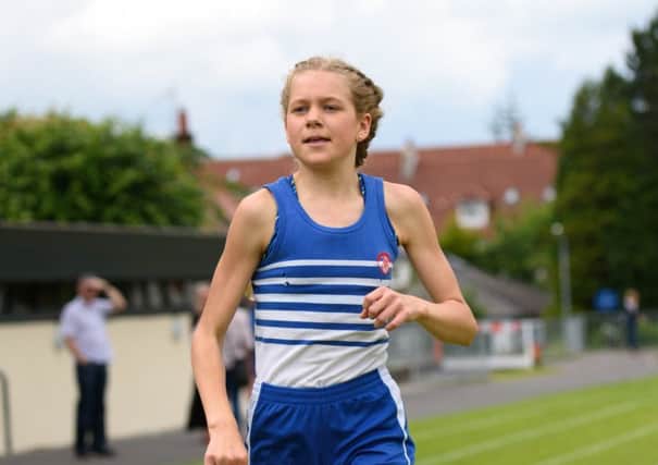 Lily Evans Haggerty, 13, has bloomed in Under-15 events.