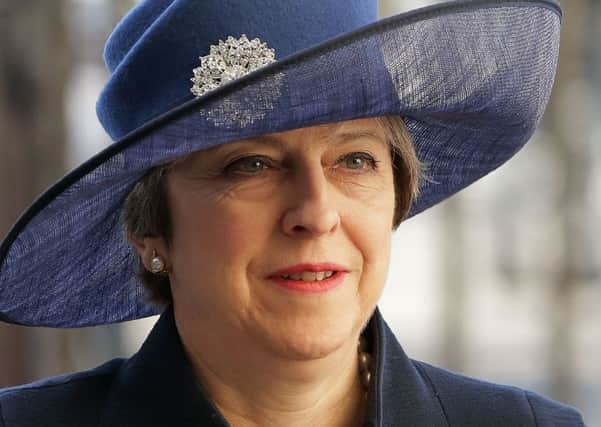 British Prime Minister Theresa May arrives to attend a Commonwealth Day Service at Westminster Abbey in central London. Picture: AFP PHOTO / Daniel LEAL-OLIVASDANIEL LEAL-OLIVAS/AFP/Getty Images