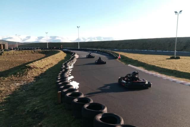 The snowy Cairngorms provide a fabulous backdrop for the Aviemore Kart Raceway