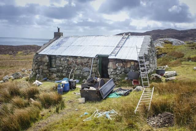 A work party from Mountain Bothies Association arrives at a shelter at Uisinis in the Western Isles. PIC: Geoff Allan.