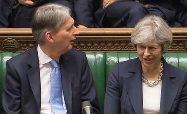 Chancellor Philip Hammond  and Prime Minister Theresa May try to put a brave face on their U-turn over hiked National Insurance contributions for the self-employed.