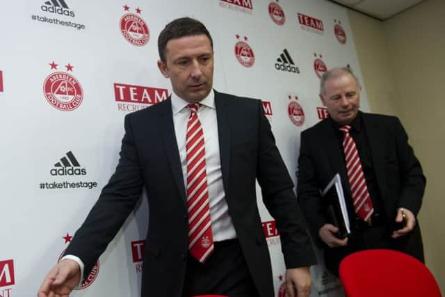 Aberdeen chairman Stewart Milne, right, wants manager Derek McInnes at the helm when the club moves to a new stadium in 2020. Picture: Bill Murray/SNS