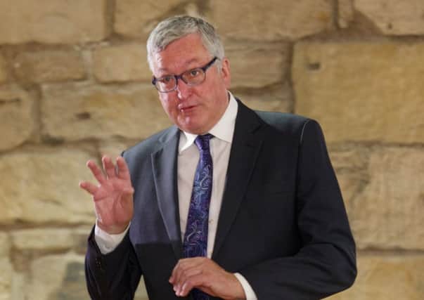 Fergus Ewing said paper applications would still be accepted. Picture: John Devlin