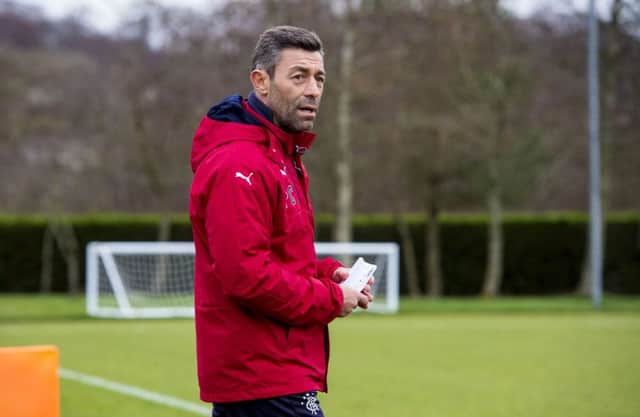 New Rangers manager Pedro Caixinha takes training this morning. Picture: SNS
