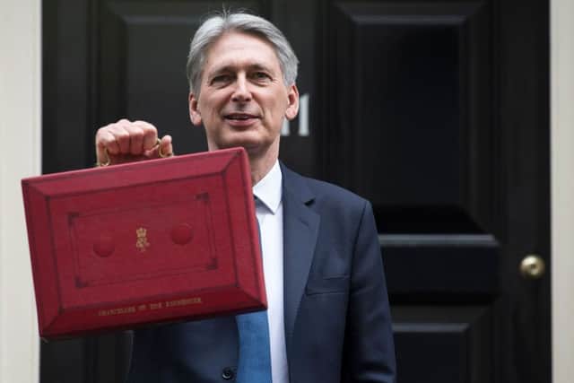 In his Budget last week, Chancellor Philip Hammond announced that the new dividend allowance is to be cut to Â£2,000, starting in April 2018. Picture: Justin Tallis/AFP/Getty Images