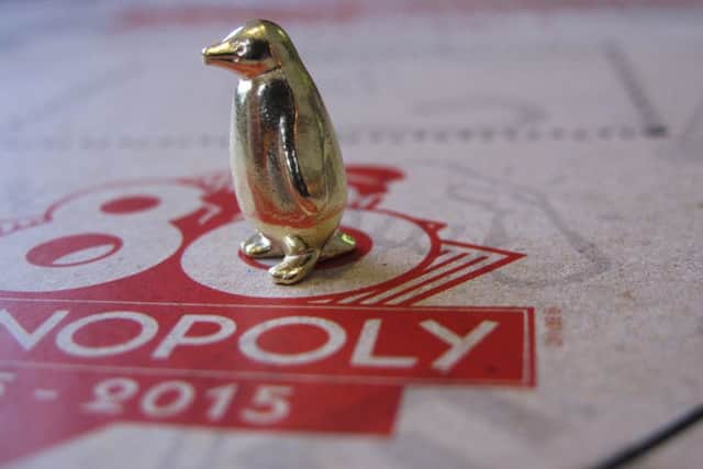A penguin is one of the three new tokens replacing the boot, the wheelbarrow and thimble. Picture: AP