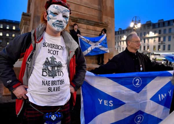 Independence supporters gather in Glasgows George Square after Nicola Sturgeons announcement last week. Photograph: Jeff J Mitchell/Getty