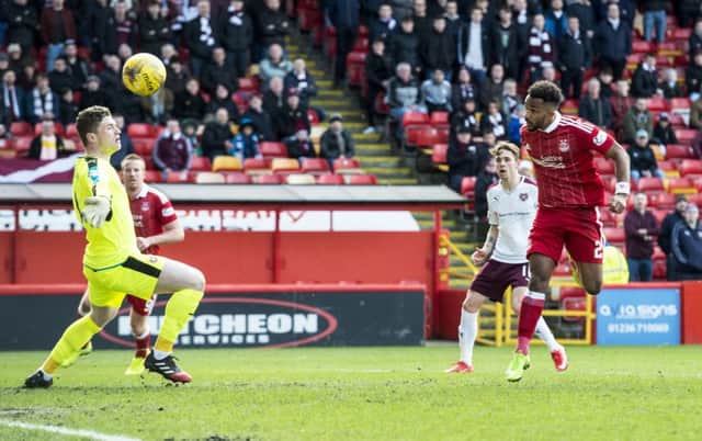 Shay Logan opens the scoring at Pittodrie as Aberdeen as ease to victory. Picture: SNS/
