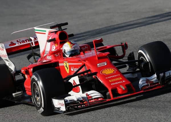 The pace of the new Ferrari, above, has given three-time world champion Lewis Hamilton plenty to think about.  Picture:  PA