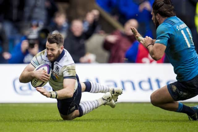 Tommy Seymour dives over to score the game's fourth try and secure the bonus point. Picture: