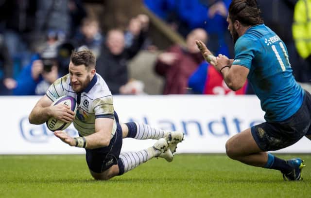 Tommy Seymour dives over to score the game's fourth try and secure the bonus point. Picture: