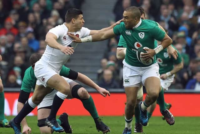 England's Ben Youngs attempts to tackle Ireland's Simon Zebo. Picture: PA Wire