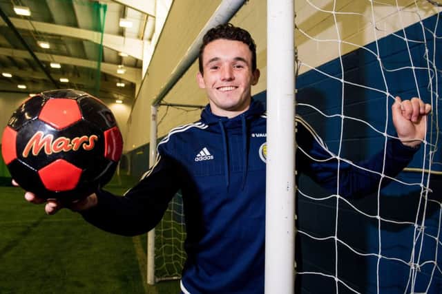 John McGinn is determined to capitalise on every opportunity to pull on a Scotland jersey. Picture: SNS.
