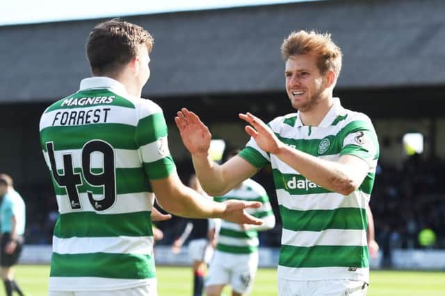 Stuart Armstrong celebrates with James Forrest after scoring against Dundee. Picture: SNS
