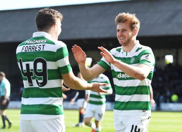 Stuart Armstrong celebrates with James Forrest after scoring against Dundee. Picture: SNS