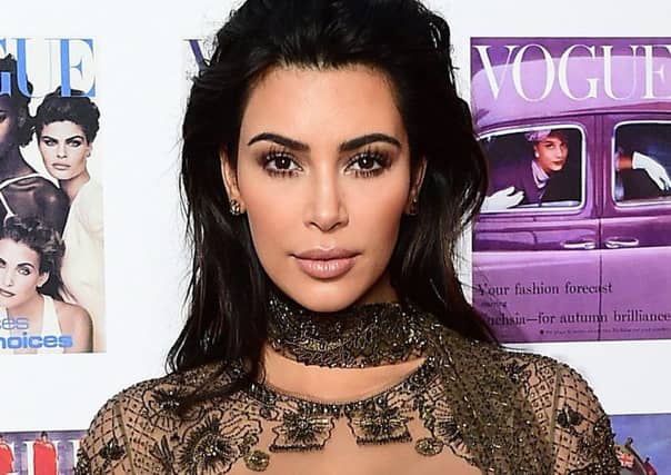 Kim Kardashian West who has recalled the harrowing moment she tried to call her bodyguard for help as robbers broke into her flat in Paris. Picture: PA