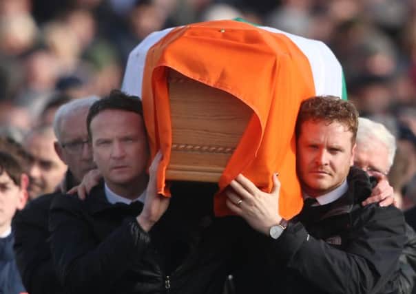 The sons of Northern Ireland's former deputy first minister and ex-IRA commander Martin McGuinness  carry his coffin to his home in Londonderry (Niall Carson/PA Wire)
