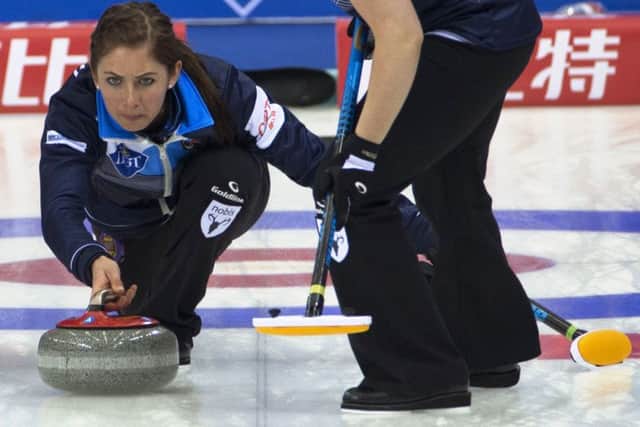 Scotland's Eve Muirhead prepares to release a stone during the win over Switzerland at the World Curling Championship in Beijing. Picture: Ng Han Guan/AP