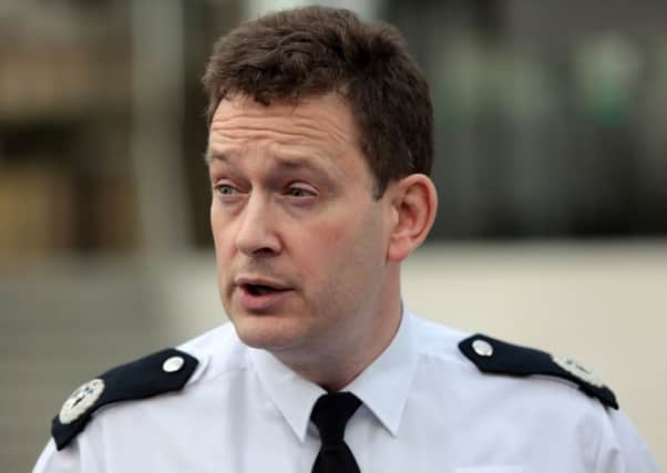 Commander BJ Harrington of the Metropolitan Police makes a statement outside of New Scotland Yard. Picture: Getty Images